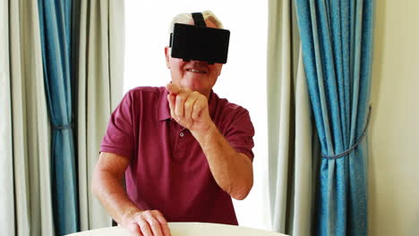 Portrait-of-retired-man-wearing-virtual-glasses