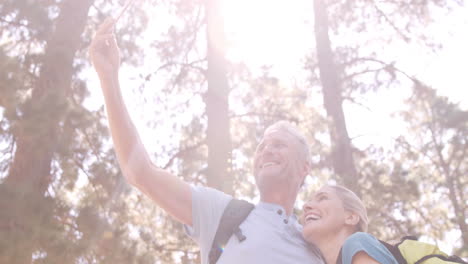 Hiker-couple-taking-selfie-while-hiking