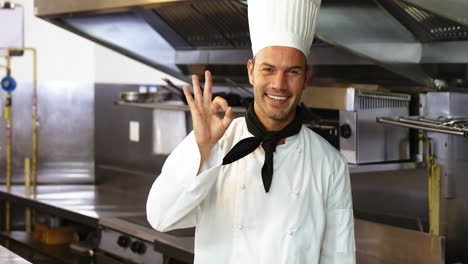 Handsome-chef-doing-an-okay-gesture