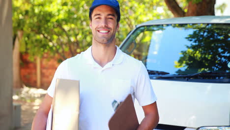 Delivery-man-carrying-a-parcel