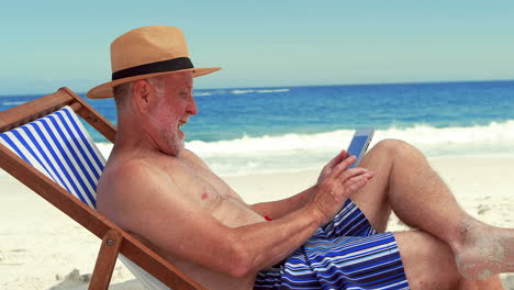 Senior-man-using-tablet