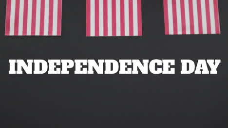 Animation-of-independence-day-text-and-flags-of-america-on-black-background