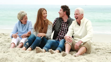 Family-talking-on-the-beach
