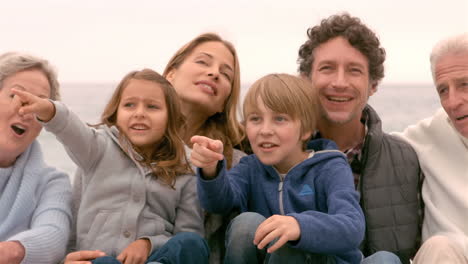 Family-sitting-and-pointing