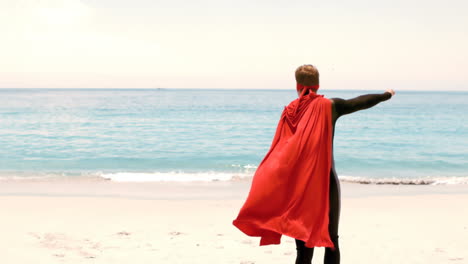 Man-in-wet-suit-dressed-as-superman