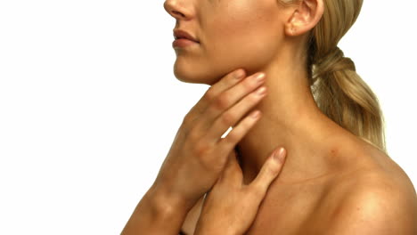 Pretty-woman-applying-cream-on-neck