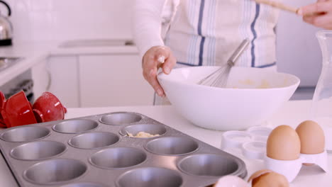 Woman-baking-muffins