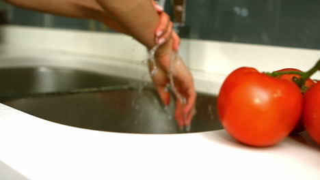 Woman-cleaning-her-hands