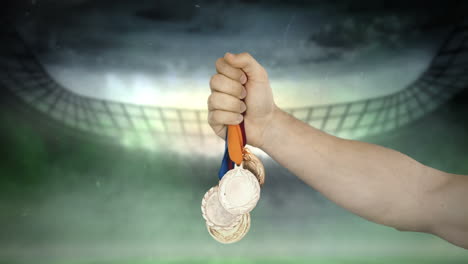 La-Mano-Está-Lanzando-Medallas