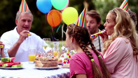 Girl-blowing-birthday-candle-in-cinemagraph-