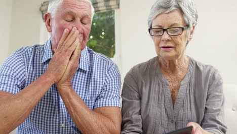 Senior-couple-paying-their-bills