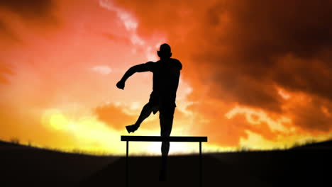 Silhouette-of-an-athlete-jumping-an-obstacle