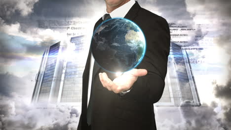 Businessman-holding-digital-generated-globe