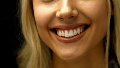 Close-up-of-a-woman-smiling