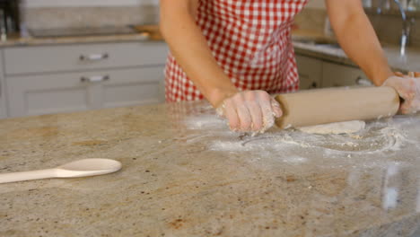 Woman-baking-with-egg-and-flour