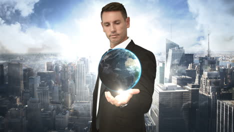 Businessman-holding-digital-generated-globe