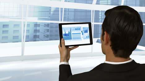 Businessman-using-digital-tablet