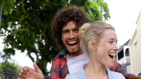 Man-covering-womans-eyes-from-behind