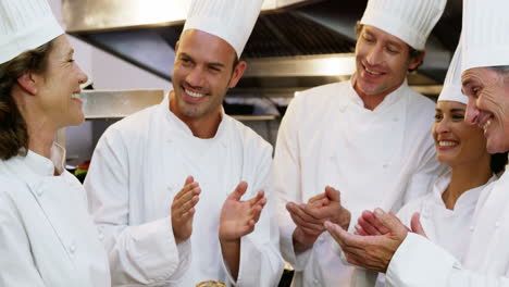 Chefs-applauding-in-the-commercial-kitchen