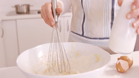 Woman-preparing-a-dough