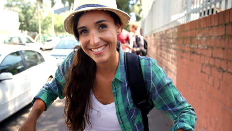 Attractive-girls-is-posing-with-her-bike-in-the-street-