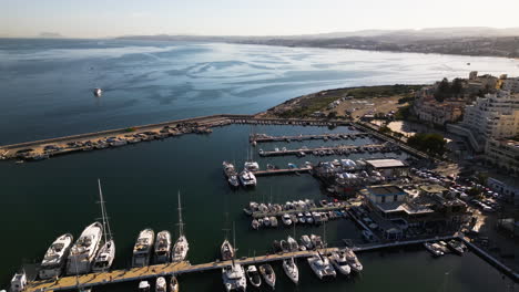 City-of-Estepona-and-beautiful-marina-with-private-yachts,-aerial-view