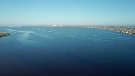 High-elevation-aerial-shot-over-the-Caloosahatchee-River-on-a-sunny-morning