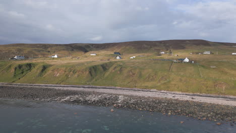 White-houses-on-Melvaig-shoreline,-Scotland