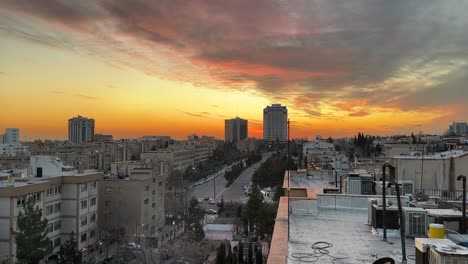 Wide-landscape-of-sunset-over-city-horizon-urban-wonderful-scenic-shot-of-nature-evening-orange-color-sky-colorful-vivid-landscape-background-beautiful-urban-life-people-house-building-in-iran-tehran