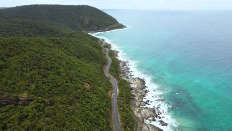 4K-Drone-Video-of-Driving-Along-The-Great-Ocean-Road-in-Victoria,-Australia