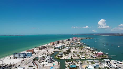 Drone-shot-showing-the-businesses-and-condos-on-Fort-Myers-Beach