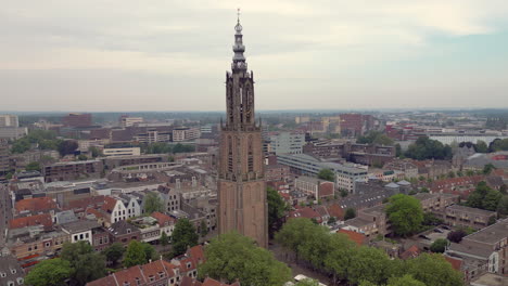 Aerial-circle-of-the-Lieve-vrouwe-Church-tower-at-Amersfoort,-The-Netherlands