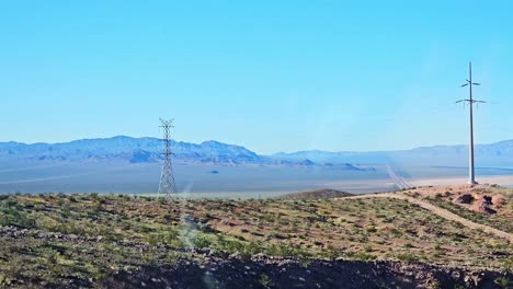Drive-By-Window-View-Over-Scenic-Landscape-in-Nevada-Desert-Along-Route-167-Northshore-Road,-USA