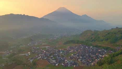Aerial-view-over-the-mountains-at-Kejajar-village-in-Wonosobo,-Indonesia