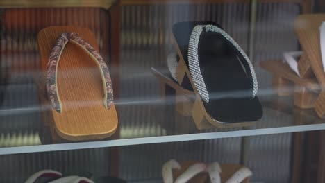 Geta-traditional-Japanese-wooden-shoes-for-sale-in-the-store,-traditional,-sandals