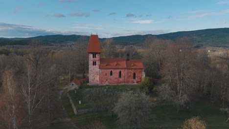 Flying-up-at-the-church-of-saint-Mikuláš-in-Boletice-in-Czechia,-Europe