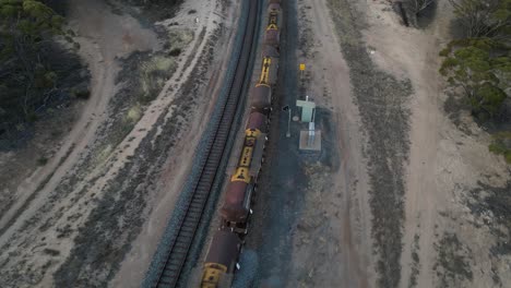 Cargo-train-loaded-with-fuel-stopped-on-tracks-in-rural-area-of-Australia