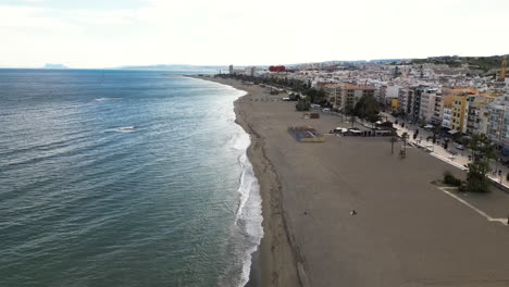 Sandy-beach-resort-with-many-coastal-hotel-in-Spain,-aerial-view
