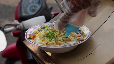 A-bowl-of-Indonesian-porridge-on-a-street-vendor's-cart-ready-to-be-served