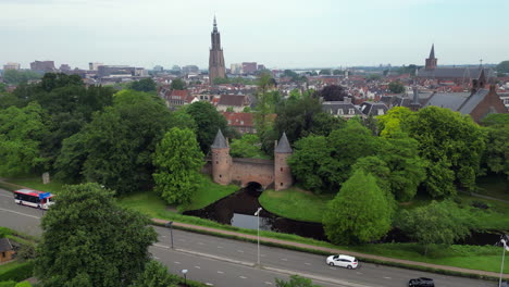 Aerial-view-of-Lieve-Vrouwe-Chruch-Tower-and-Monnikendam-Gate-at-Amersfoort-city,-the-netherlands