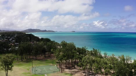 Drone-shot-over-the-Waimānalo-Beach-Park's-basketball-court-in-Hawaii