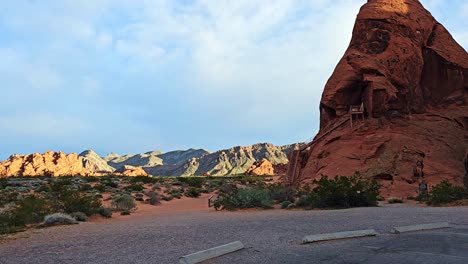 Atlatl-Rock-at-the-Valley-of-Fire-with-Slow-Panning-Views-of-Beautiful-Landscape-in-Warm-Sunlight,-Nevada,-USA