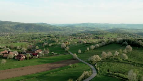 Aerial-drone-footage-of-a-scenic,-lush-landscape-near-Hrinova,-Slovakia,-during-springtime