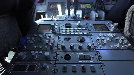 Upward-view-of-the-flight-instruments-and-controlls-of-a-jet-during-a-flight