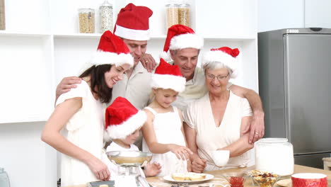Family-doing-their-Christmas-baking-in-the-kitchen-