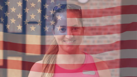 Animation-of-american-flag-over-caucasian-woman-sportswear