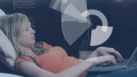 Animation-of-digital-data-processing-over-caucasian-businesswoman-using-laptop