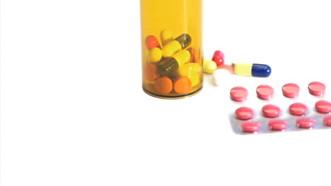 Pills-and-pill-box-rotating-