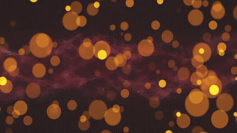 Animation-of-glowing-orange-and-yellow-bokeh-light-spots-multiplying-on-dark-background