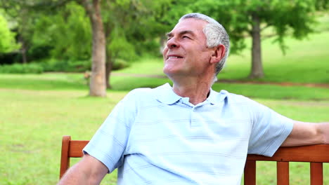 Retired-man-relaxing-on-a-park-bench